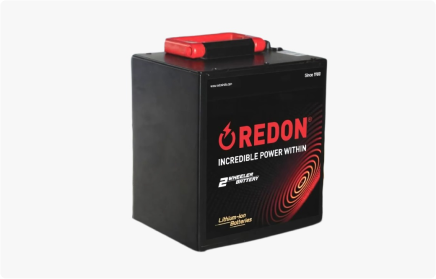 Battery with a black casing and red top, featuring "REDON" and "Incredible Power Within" text. Lithium-ion technology is highlighted.